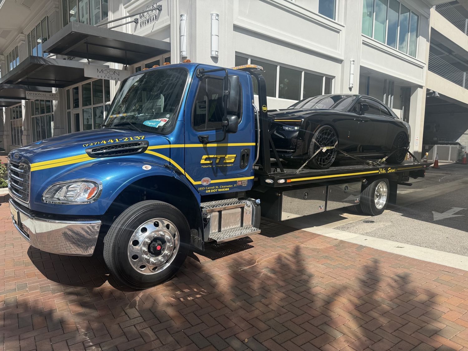 Rolls-Royce Spectre on a CTS flatbed for luxury auto transport
