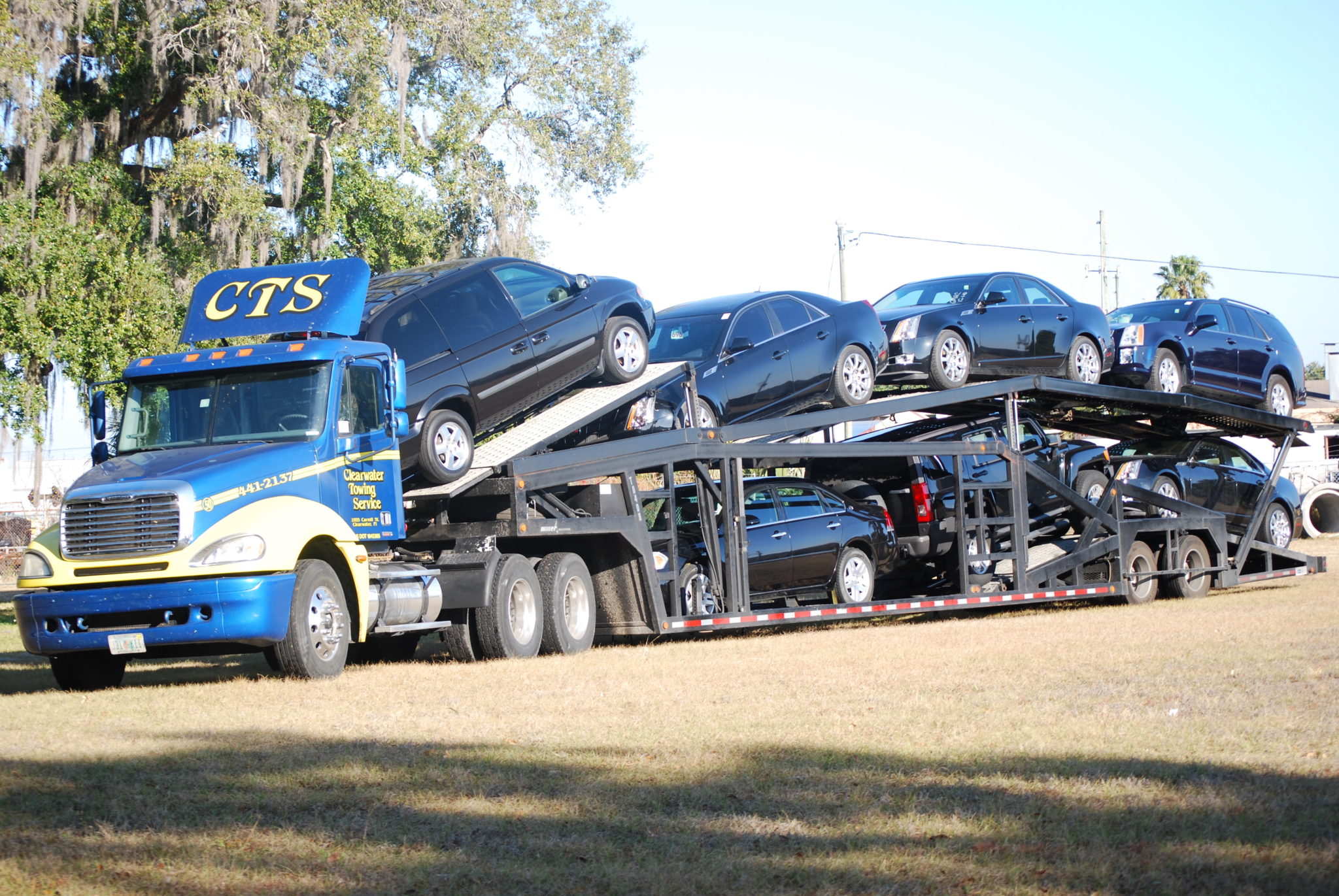 7 Car Hauler Transporting Vehicles - Commercial Towing