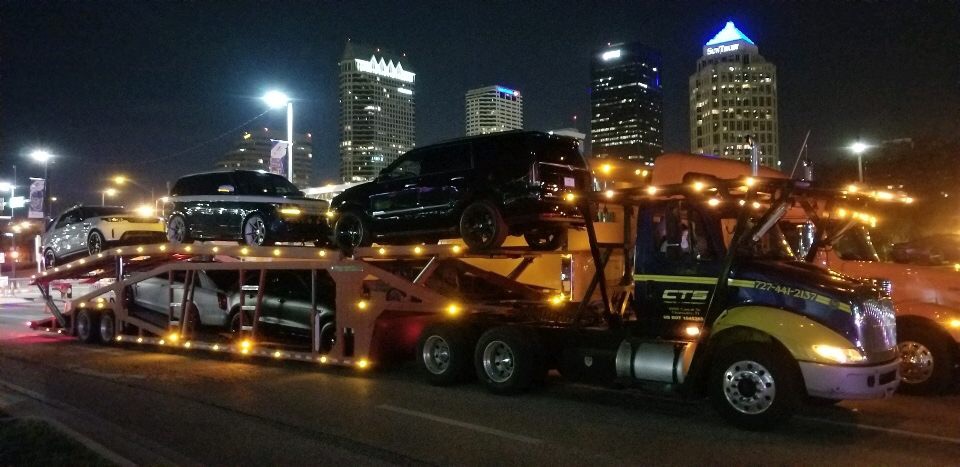 8 Car Hauler Loaded in Downtown Tampa - Commercial Towing