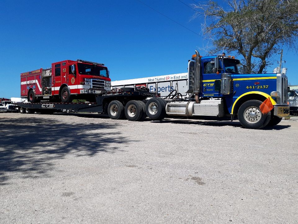 Landoll 660 Trailer Transporting a Firetruck - Commercial Towing