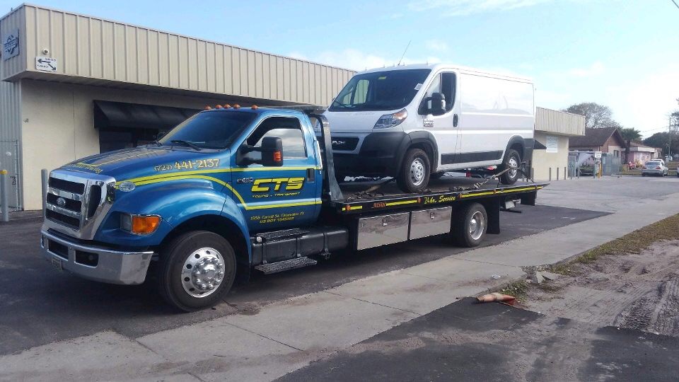 Rollback towing a Dodge Promaster - Light Duty